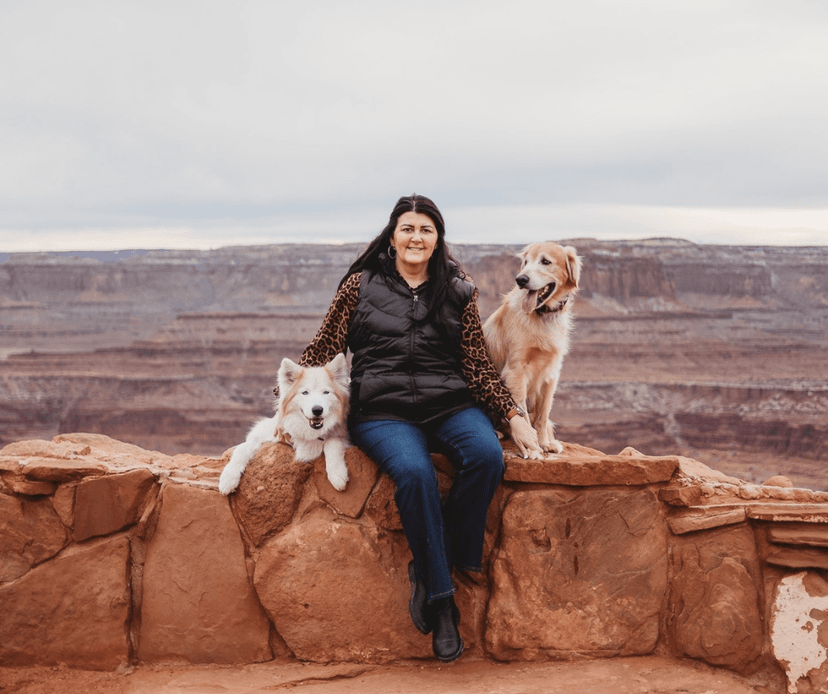 Woman with two happy dogs