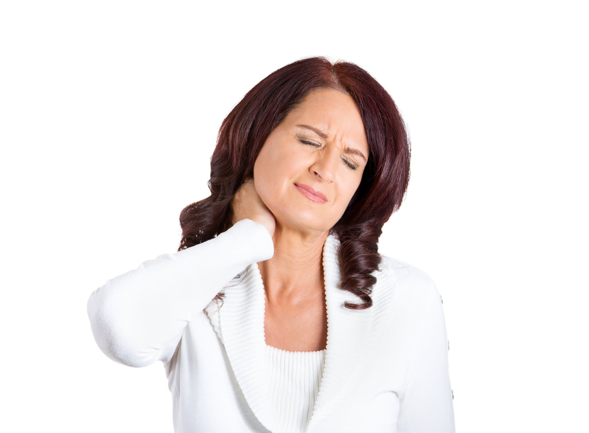 Picture of Closeup portrait stressed unhappy business woman with bad neck pain, after long hours of work or studying, isolated on white background. Negative human emotion facial expression feelings