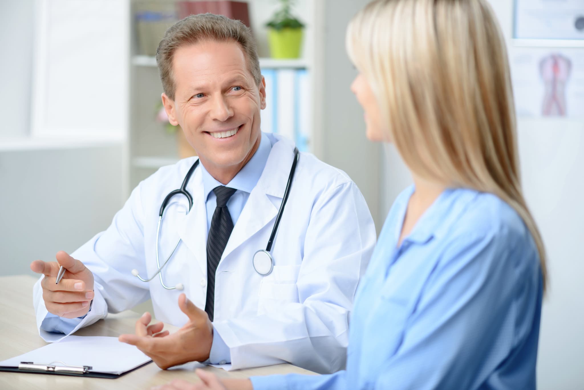 doctor talking to patient