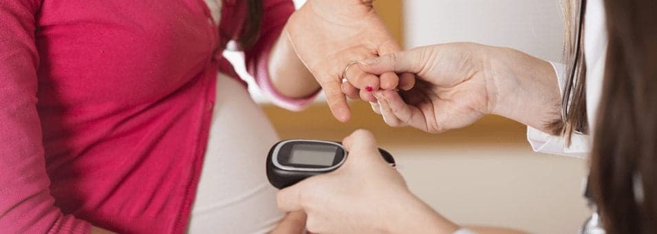 doctor checking patients Risks of Pregnancy and Diabetes
