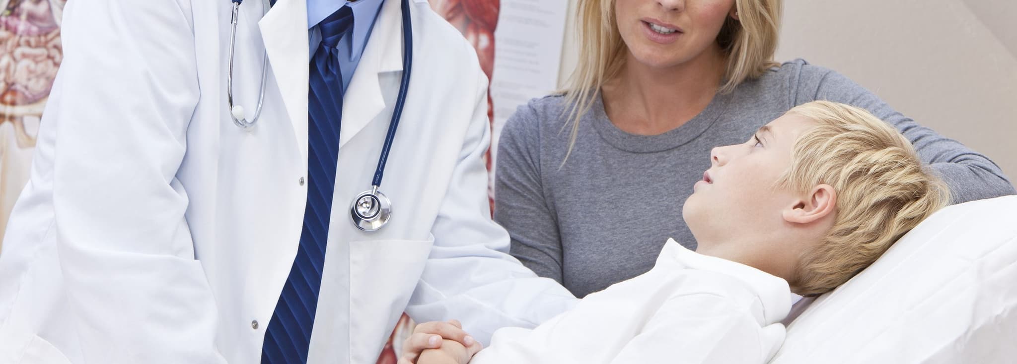 Family Doctor visiting sick child