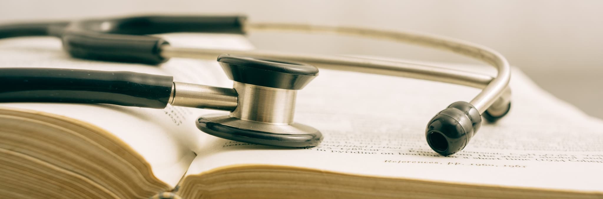 Stethoscope on open book