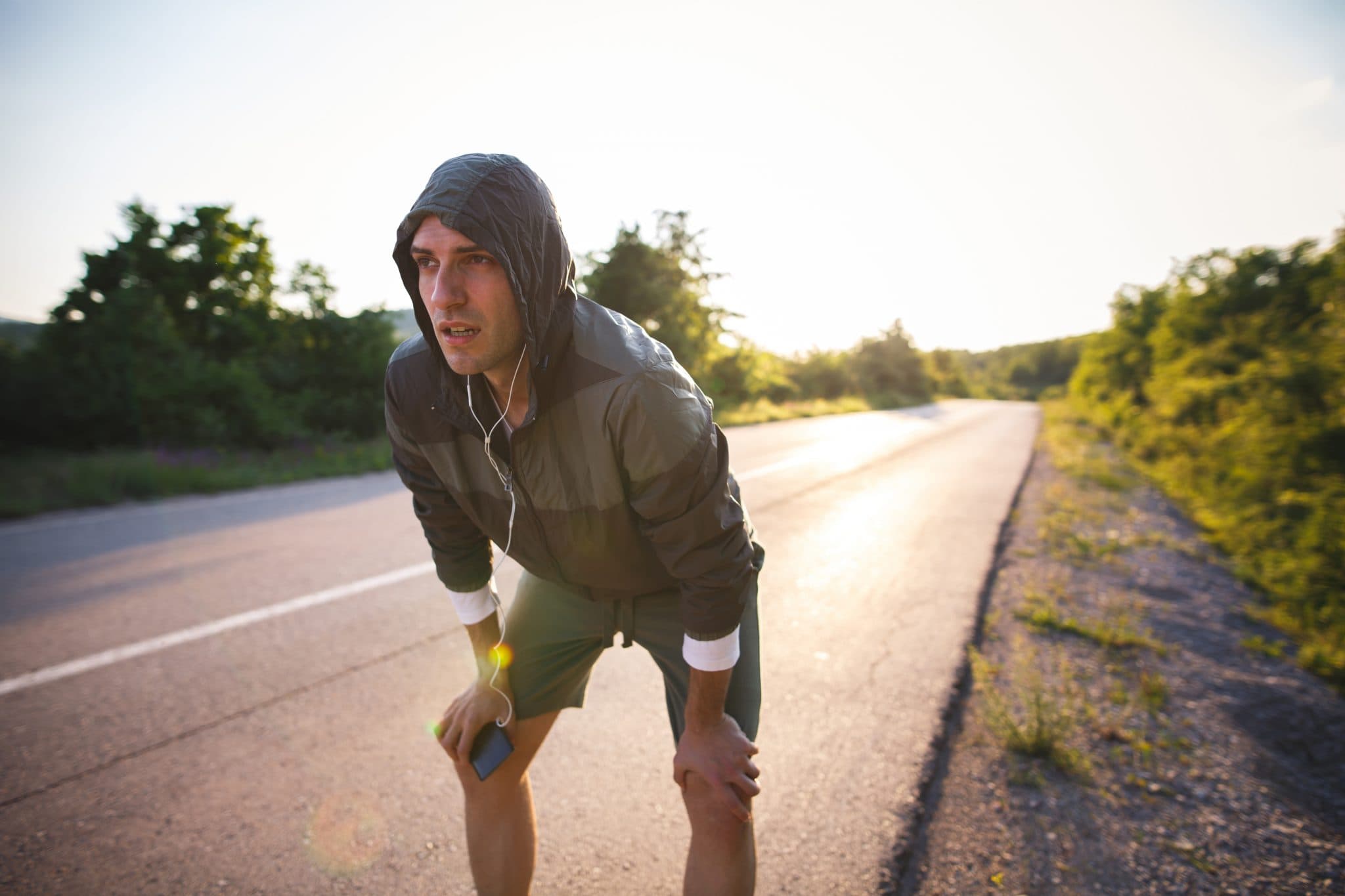 Picture of Photo of exhausted runner on the road