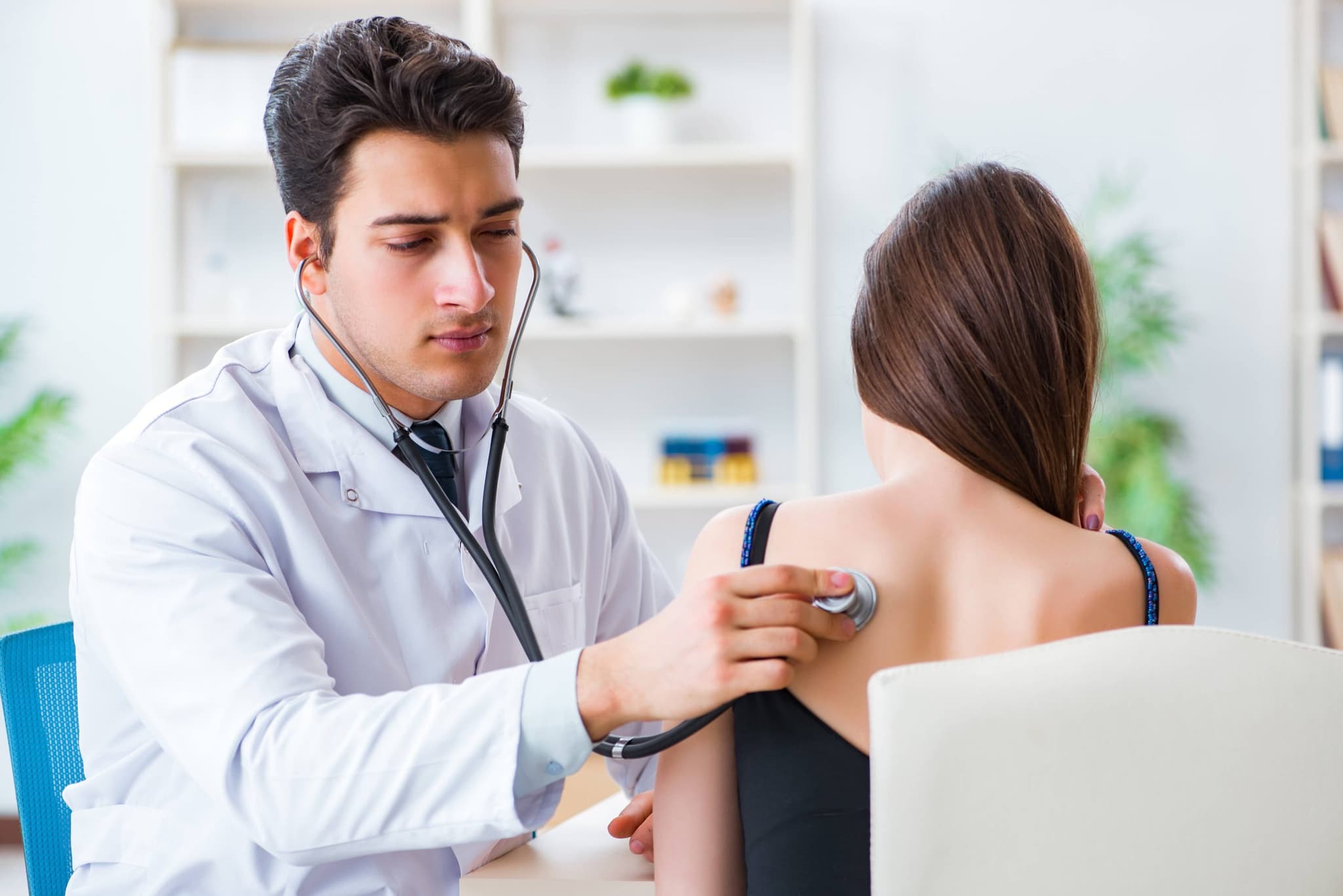 Picture of Doctor checks patients lungs