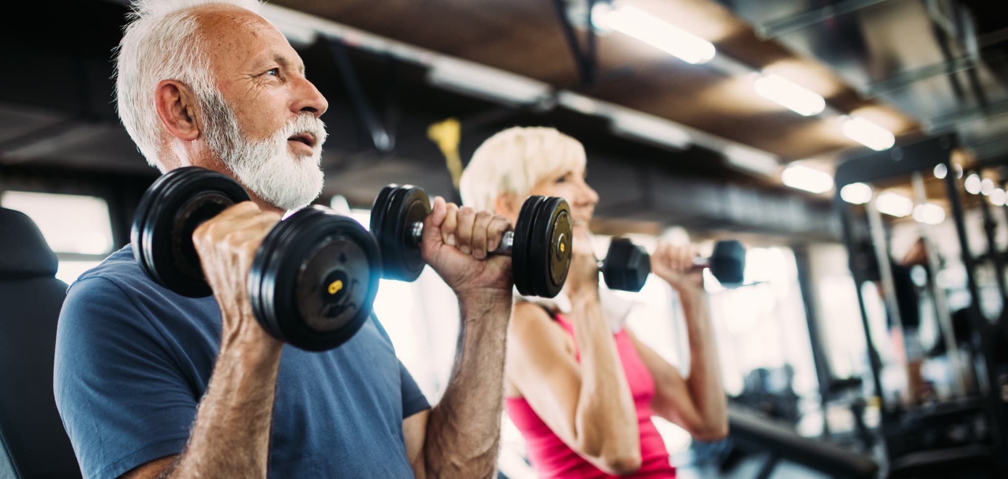 Fit mature sporty couple working out to stay healthy